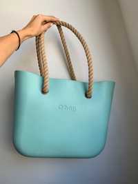 Чанта “ O’ bag”  Удобна побираща всичко чанта. Свеж светло син цвят.