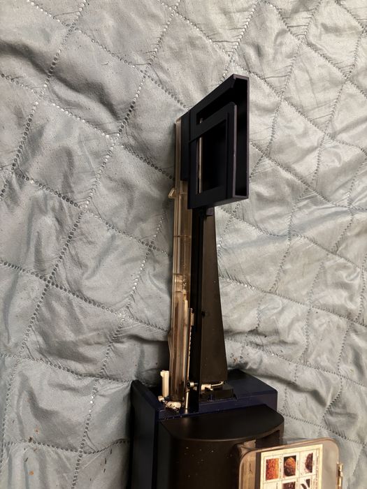 Masina electrica automata de facut tigari /injectat tutun in tuburi.