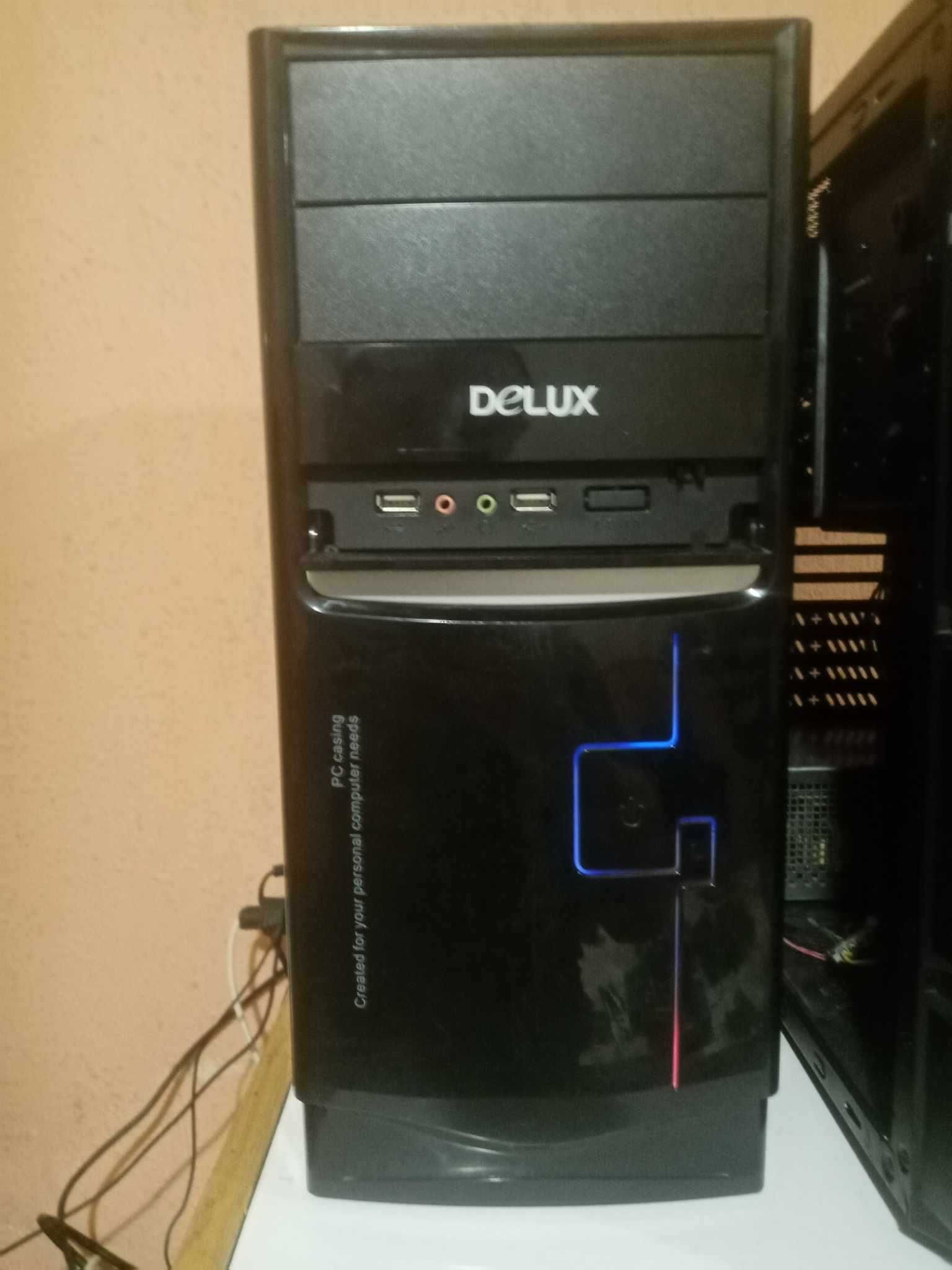 Мощен -бюджетен компютър DELUX Amd X4 9650, Nvidia GeForce 210, 8GB