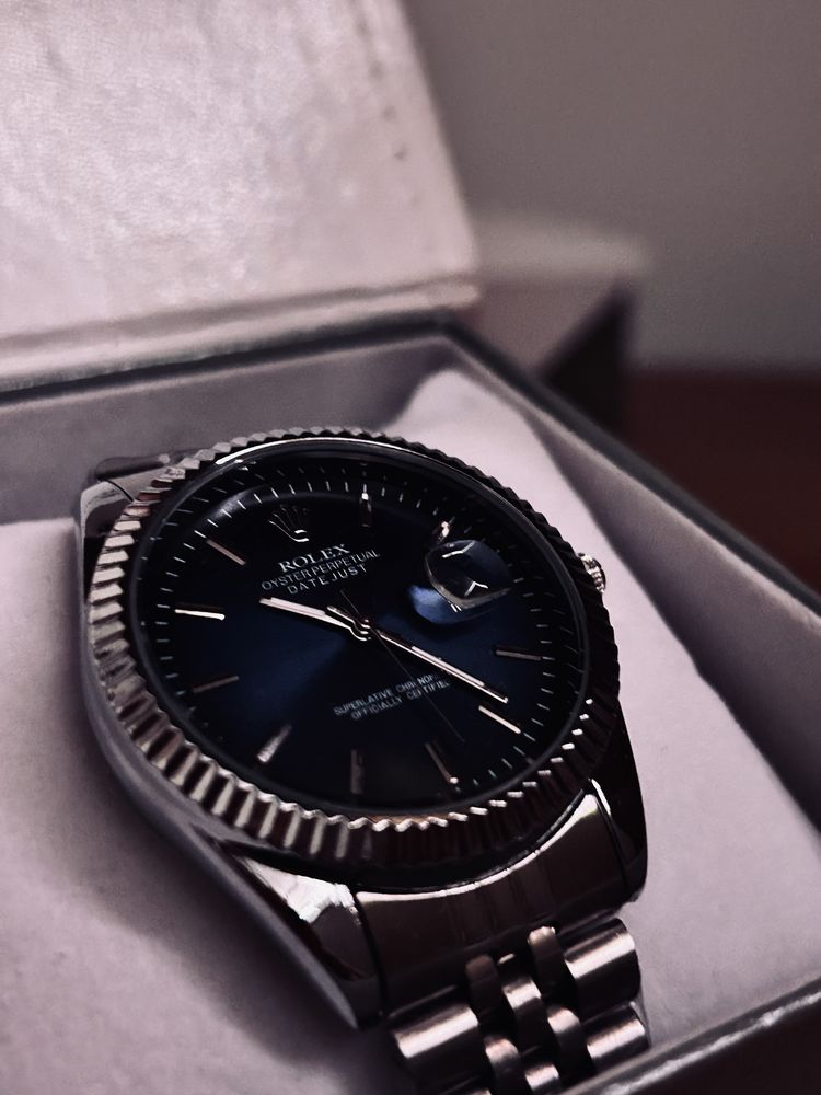 Часы Rolex.