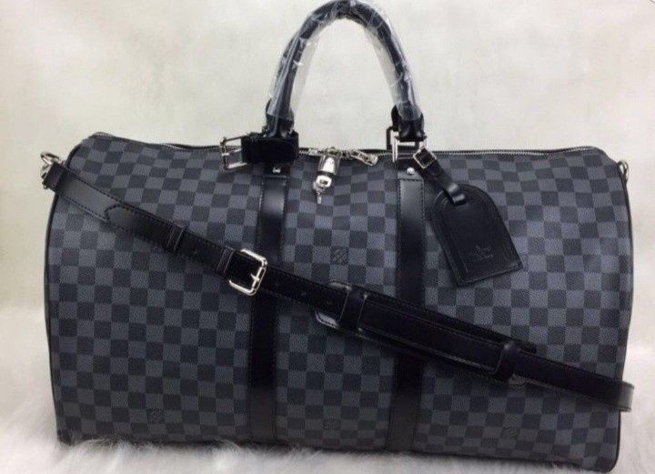 Geanta voiaj unisex,logo metalic, feronerie metalica, saculet