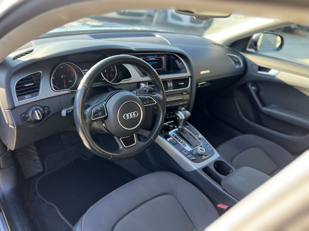 Audi A5 2.0TDI spotrback Quattro .