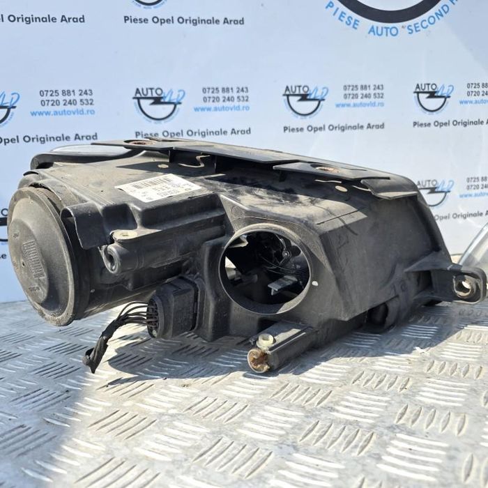 Far stanga cu lupa Volkswagen Passat B6 3C