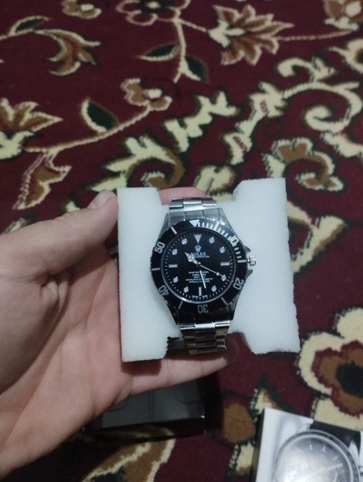 Soat va hamyon 2 tasi bittada