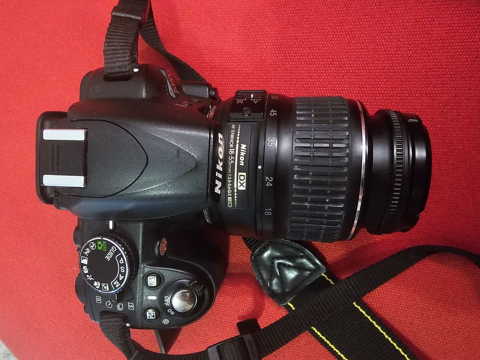 Nikon D3100 + 18-55mm