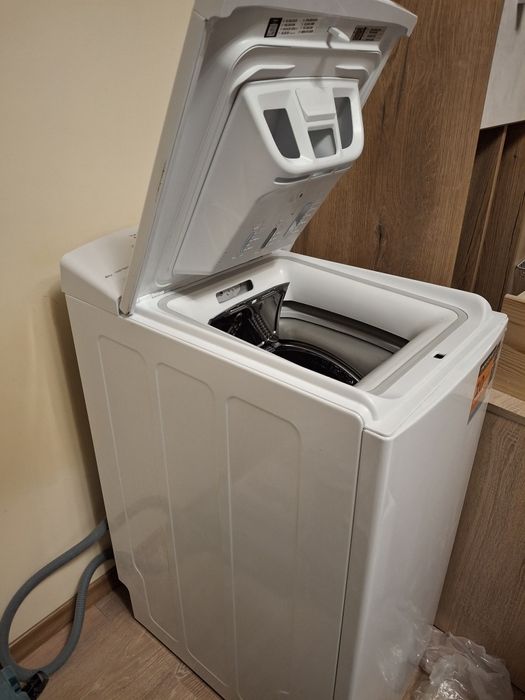 Пералня с горно зареждане Уърлпул