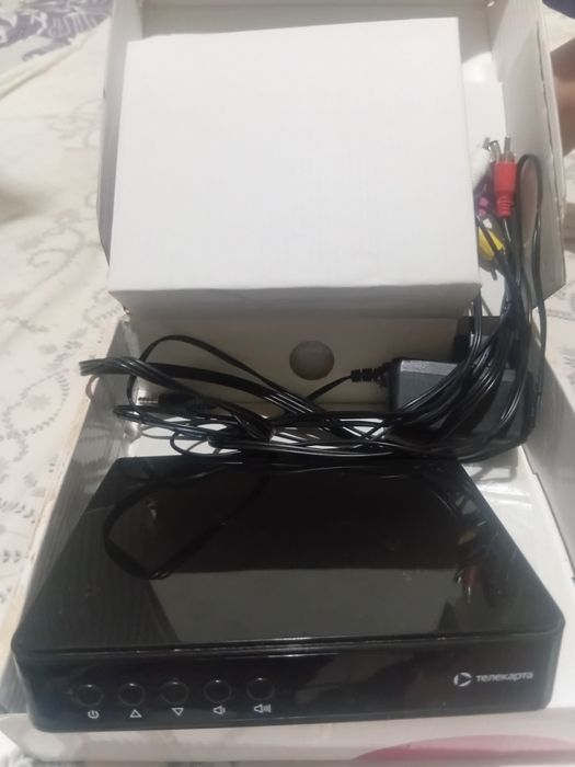 Это  т е л е к а р т а, с п у т н и к о в о е