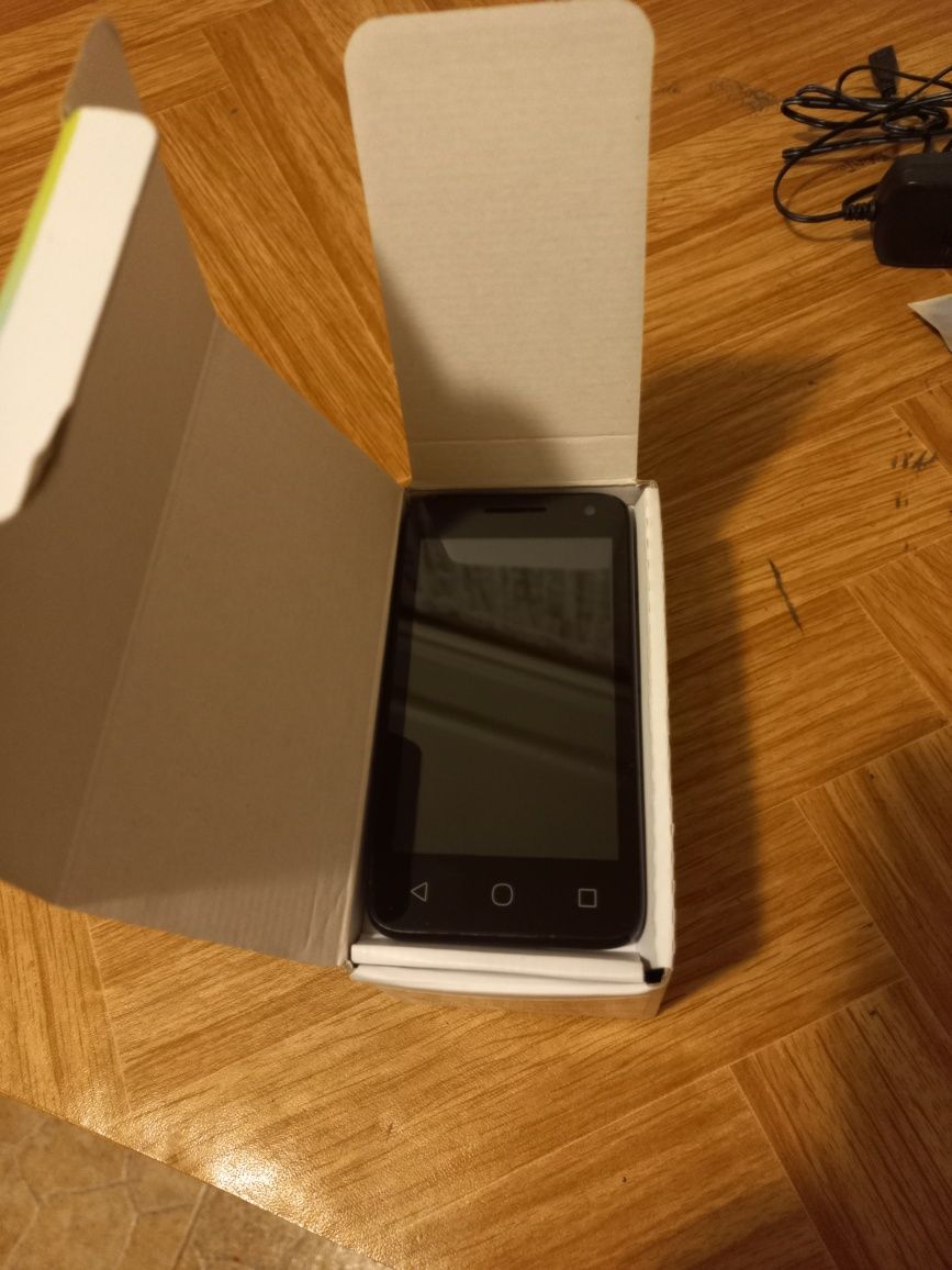Alcatel U3 чисто нов