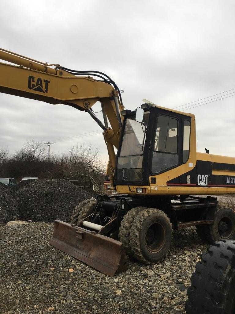 Dezmembrez Excavator Caterpillar M318