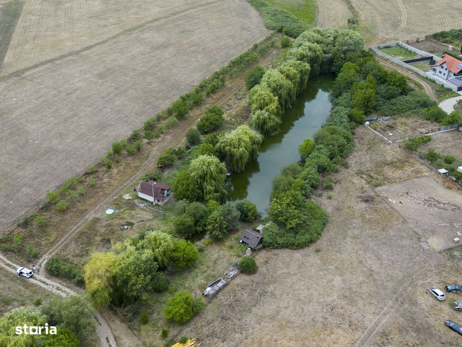 Teren de 7900 mp cu baltă de pescuit în Frumușeni