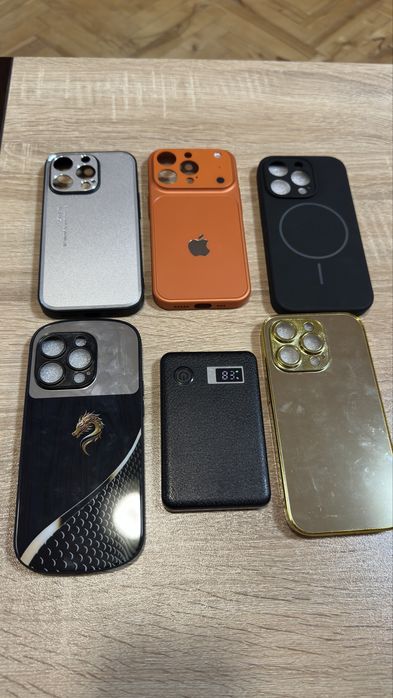 Лот от батерия и 5 кейса за iphone 14 pro