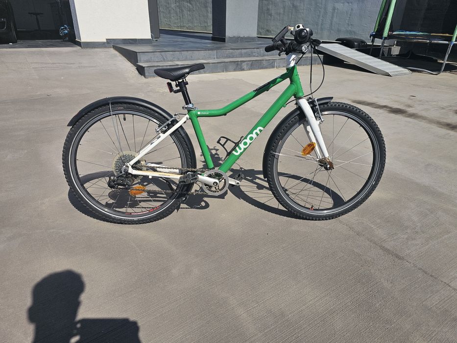 Bicicleta woom din aluminium pentru copi de 6-12 ani