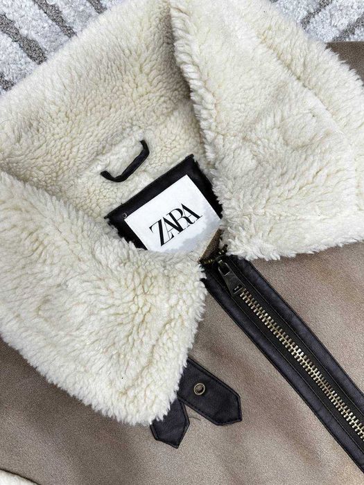 Одежда. Жилетка зимняя