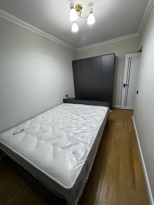 М.Ойбек , 2/2/4 , 56 м2 ,квартира с новым ремонтом и техникой