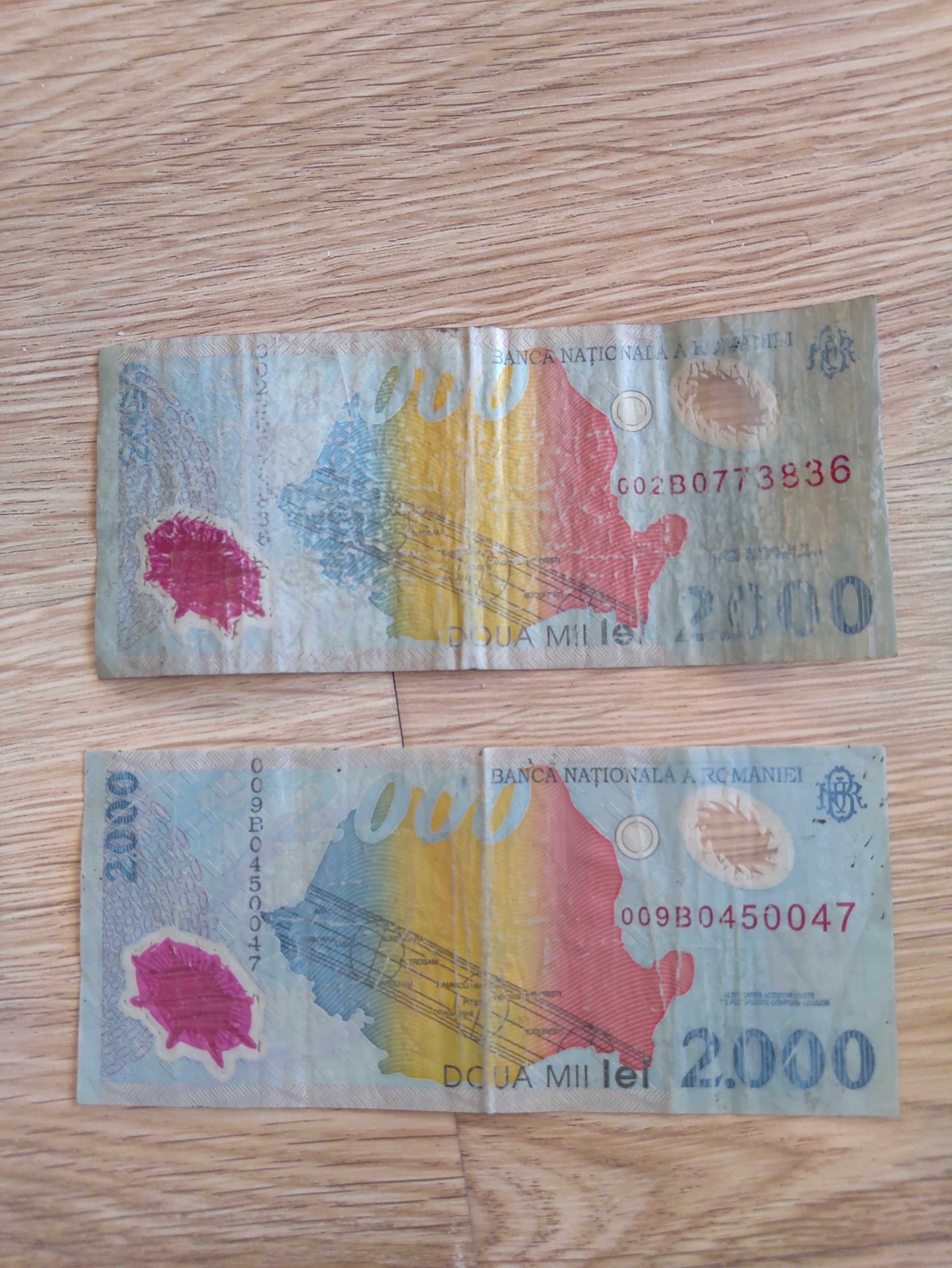 Moneda 1 euro și bancnote 2000 lei.