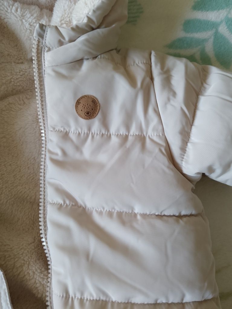 Vând combinezon de iarna 62,H&M,potrivit până la 74.