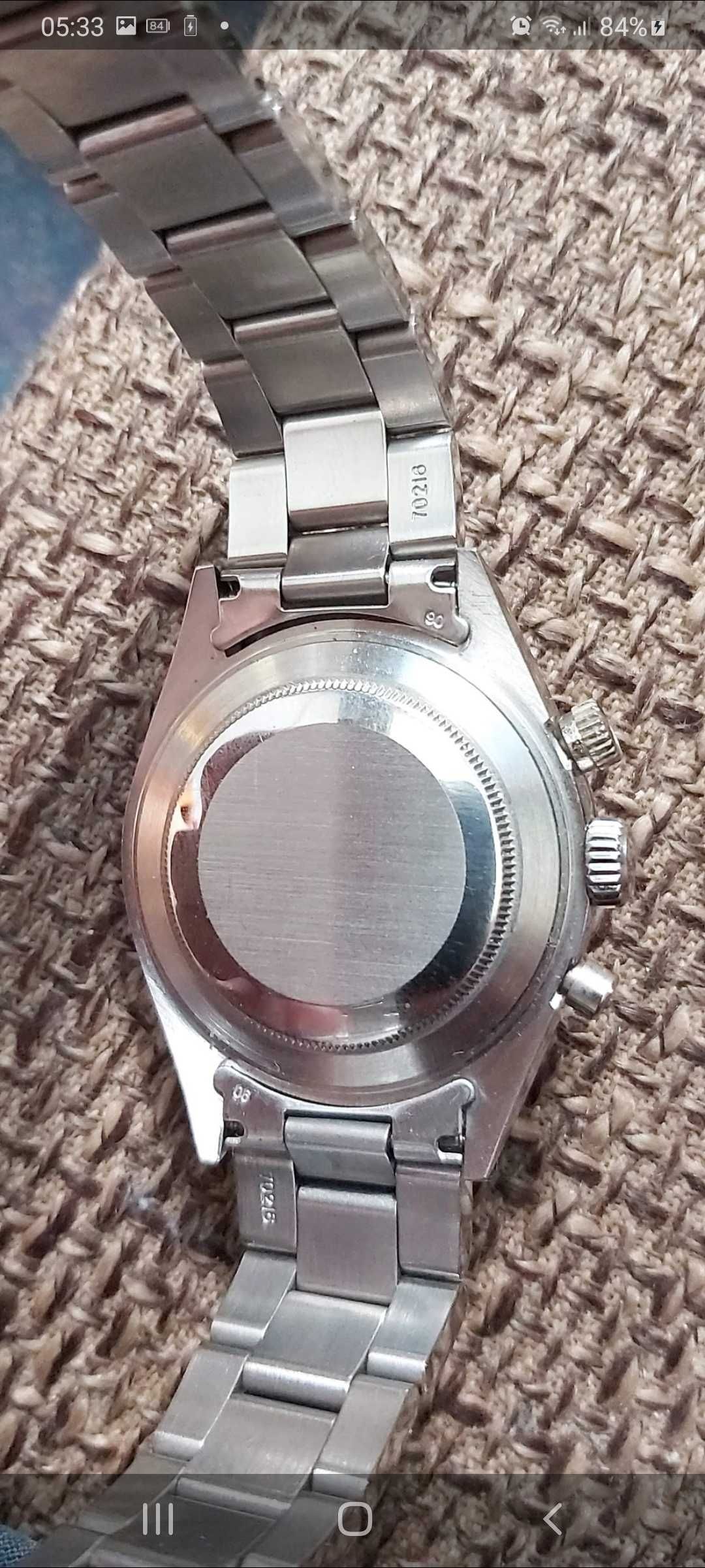 Rolex Daytona Cosmograph  seiko chronograph swatch