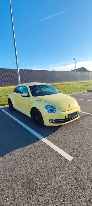 VW BEETLE 1.2 BENZINA 105 CP
2 geamuri electrice
dublu climatronic
sen