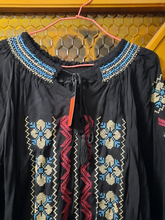 Ie nouă cu etichetă