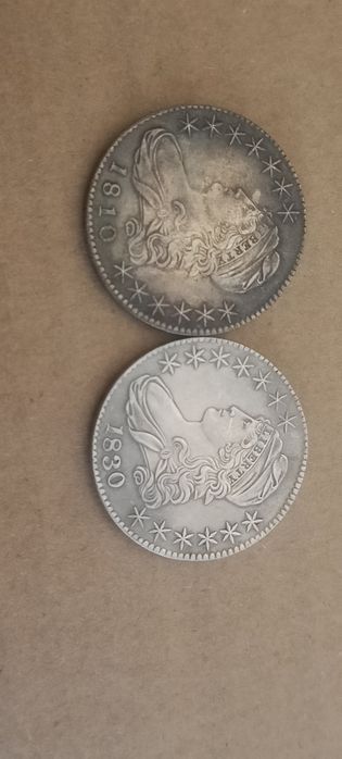 Două monede half dolar american