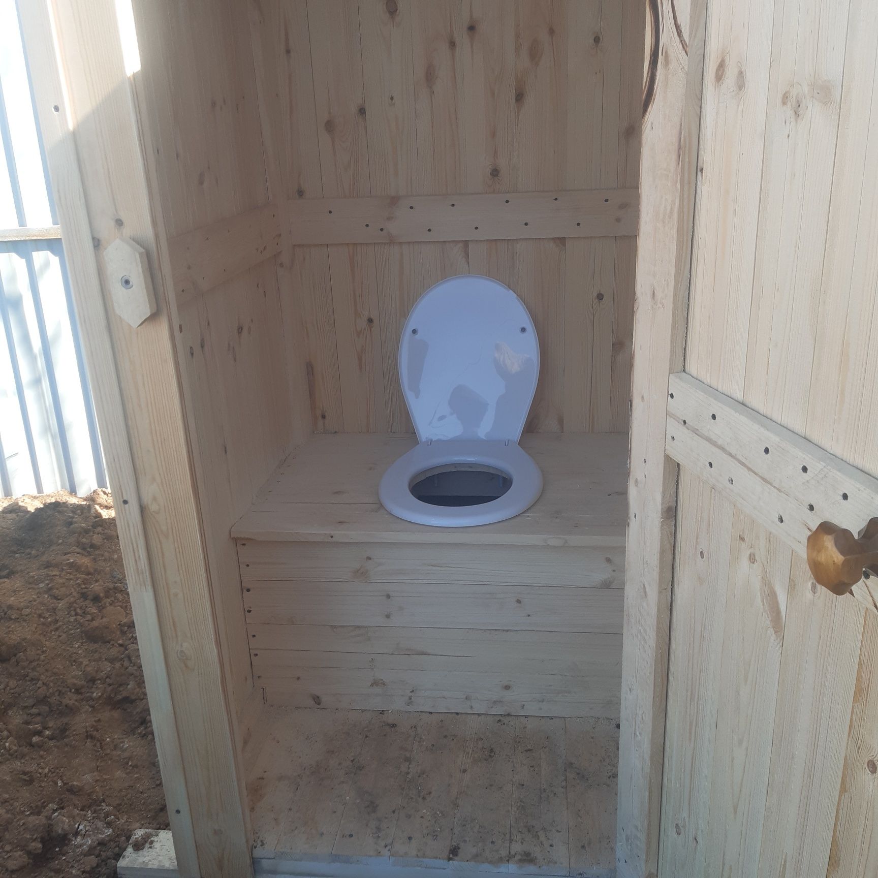 Туалет деревянные из вогонка