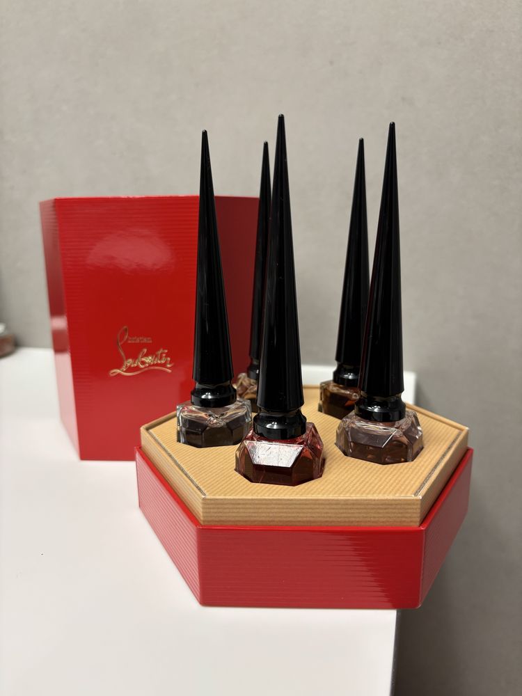 Prada, Louboutin , Annick Goutal, Nicolaï