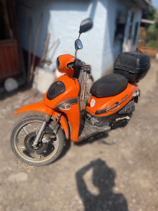 Vand scuter kymco