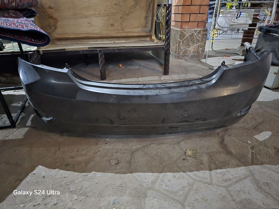 Задний бампер оригинал