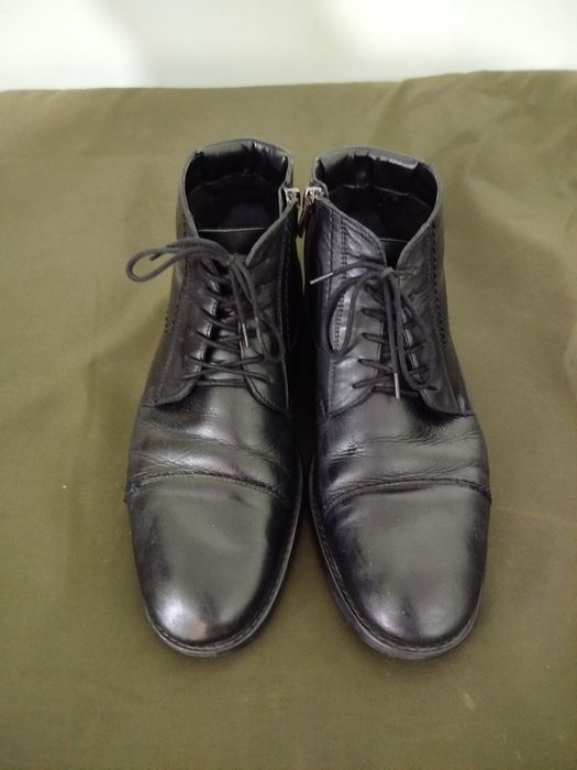 Продам фирменные сапоги.