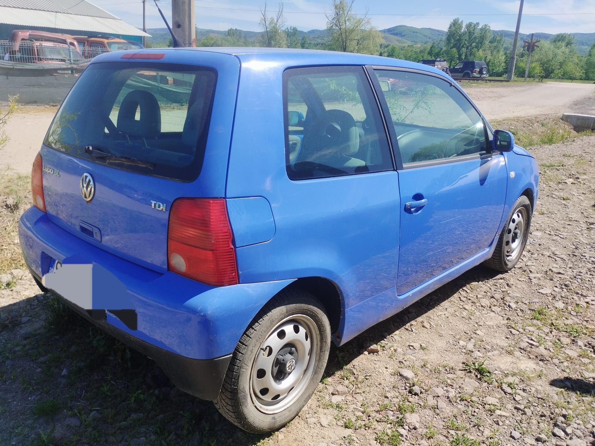 Volkswagen lupo 3L
1.2 tdi
Cutie automata 
Geamuri electrice 
Oglinzi