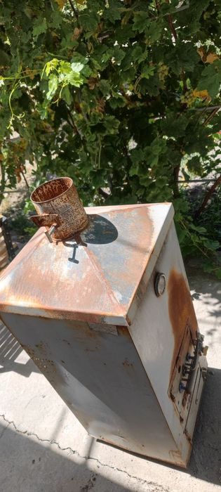 Котёл отопительный многотопливный КОМ-16