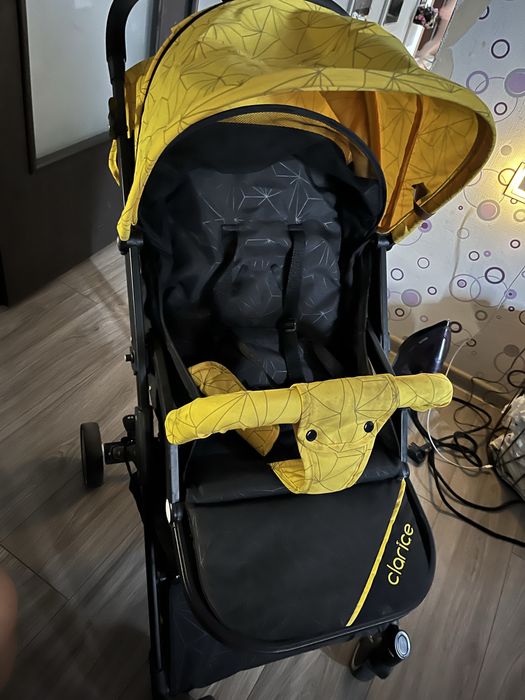 Carucior sport, galben cu negru stare foarte buna cu copertina