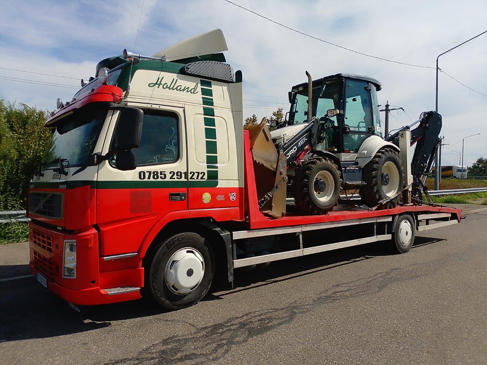 Transport utilaje ALEXANDRIA transport tractor combina Trailer telorma