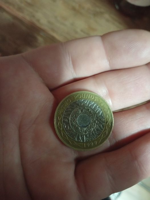vând moneda anul 1999