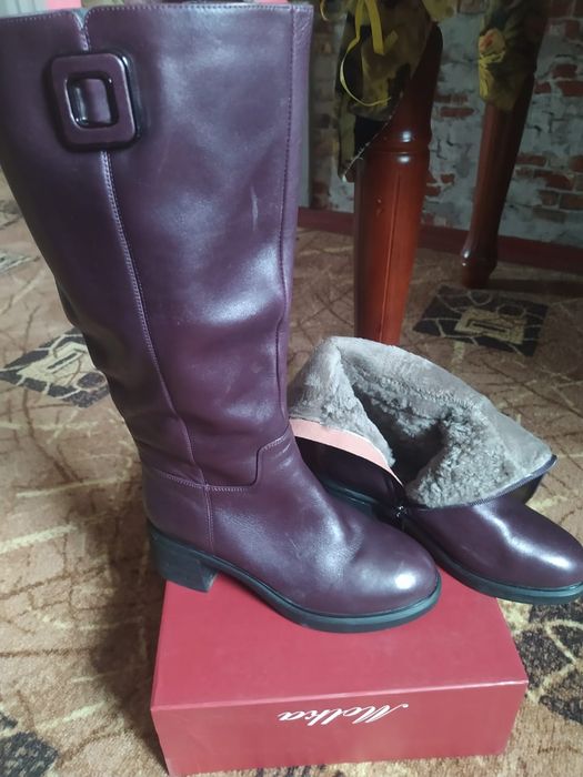 Продам новые сапоги