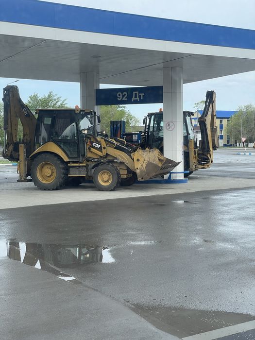 эксковатор погрузчик 3в1