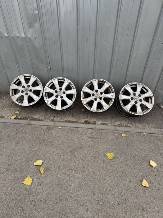 Продам титановые диски, 16 пяти дырые на Тайоту Каролу.