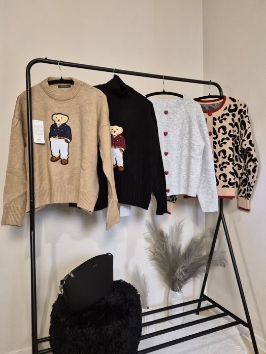 Пуловери и жилетки