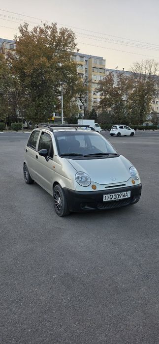 Матиз с метан газом и с кондиционером.