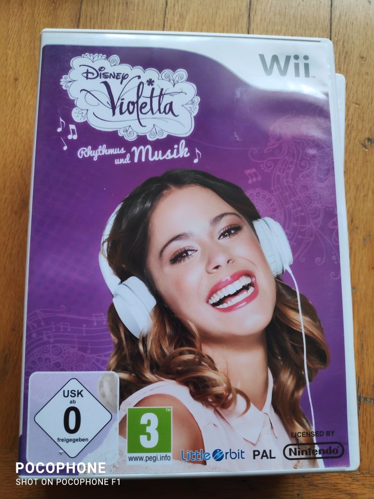 Игри за Wii ,Play Station 2 и 3 и опаковката за една PS 4 игра.