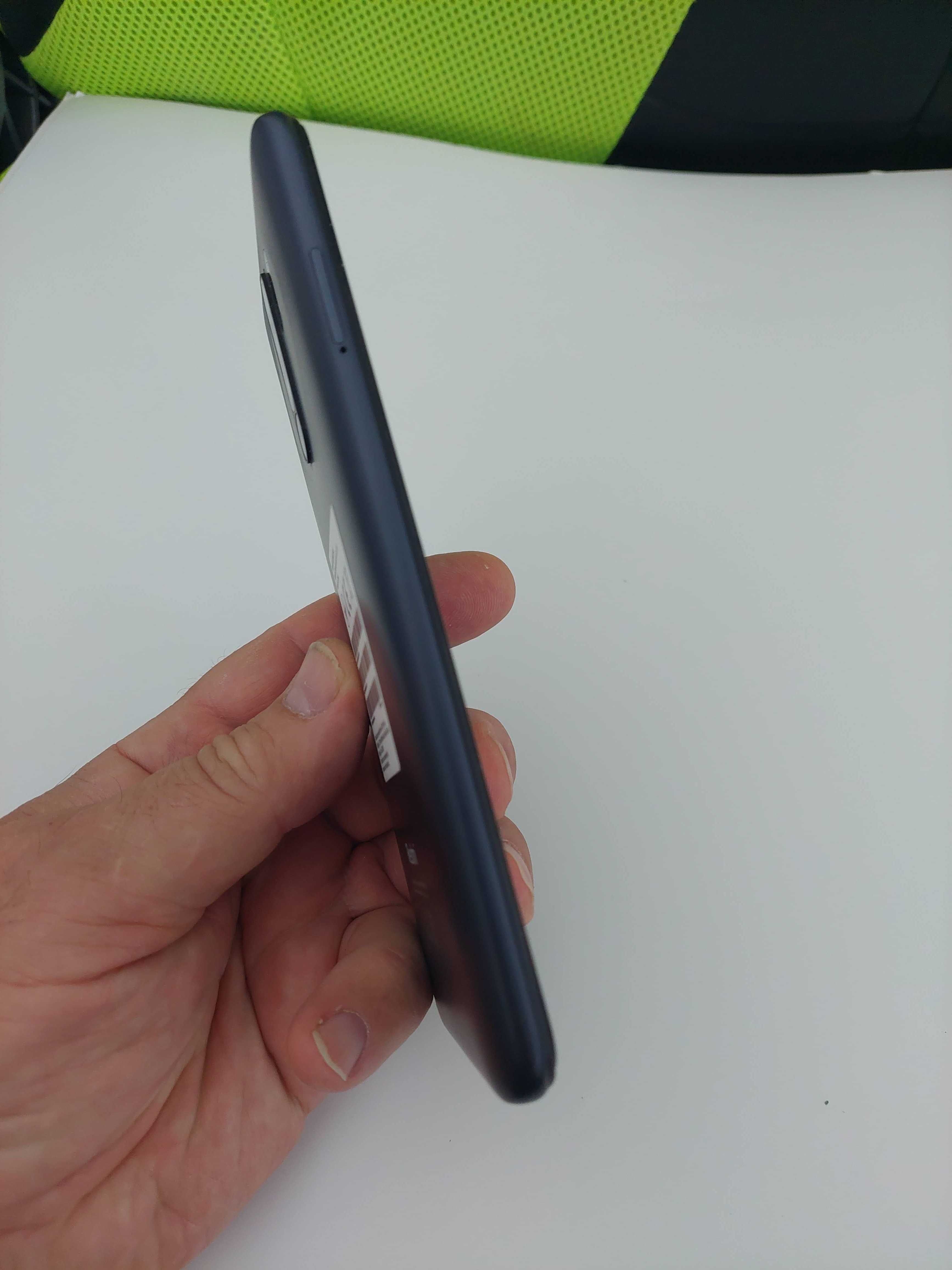 Телефон Xiaomi Redmi 9