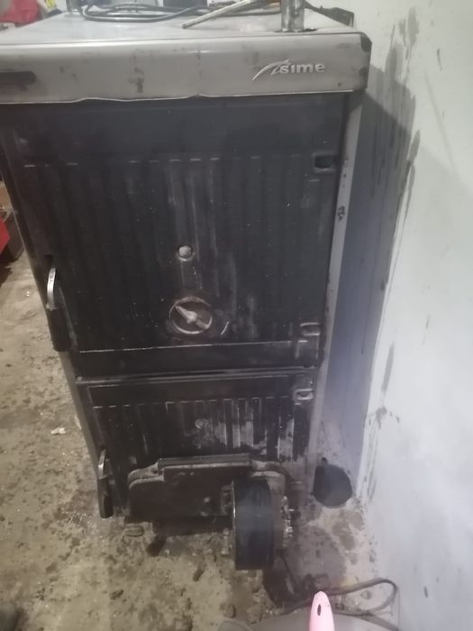 Vând centrală Sime de fontă, 40 kw