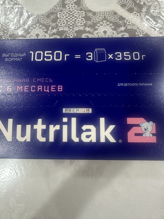 Смесь для детей  Nutrilak с 6 месяцев