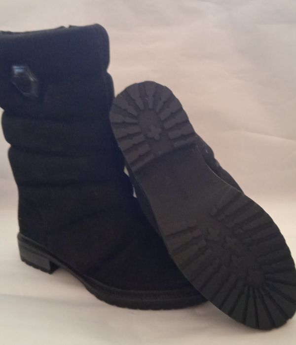 Продам новые сапоги