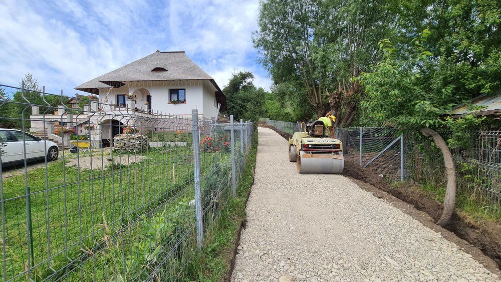 Executam drum acces, alei pietonale si parcari