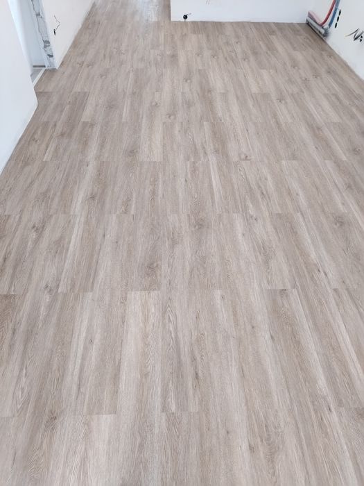 Укладка ламината, кварцвинила, керамогранит, и многое другое