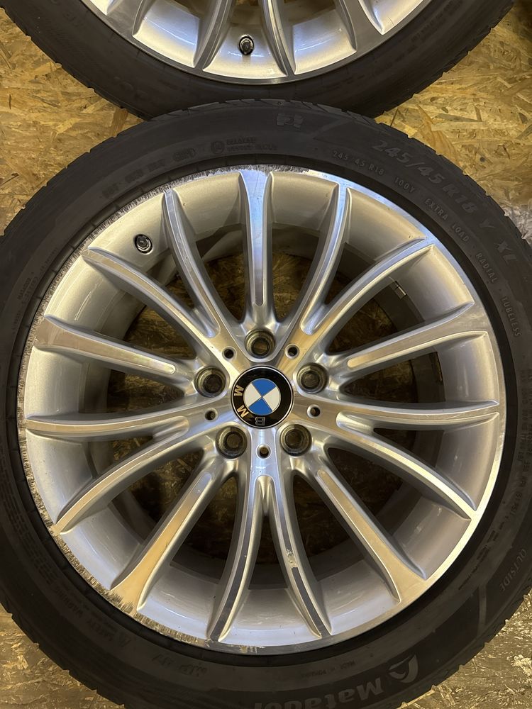 Se vand roti originale BMW seria 5 R18 cu anvelope vara si senzori