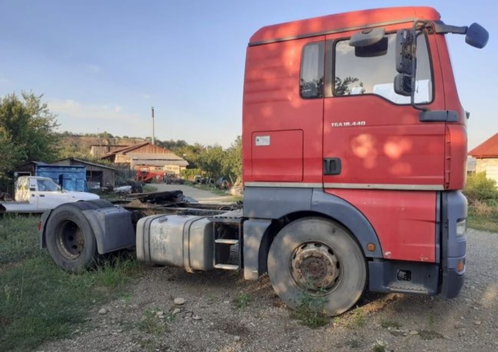 Man cap tractor de vanzare