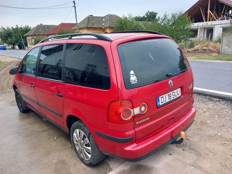 VW Sharan 2007 1.9 TDI 85 kW – 7 locuri – Climatronic bi-zonă – Roșu