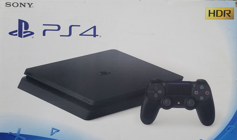 Продам PS4, б/у отличного качества + 5 дисков с играми
